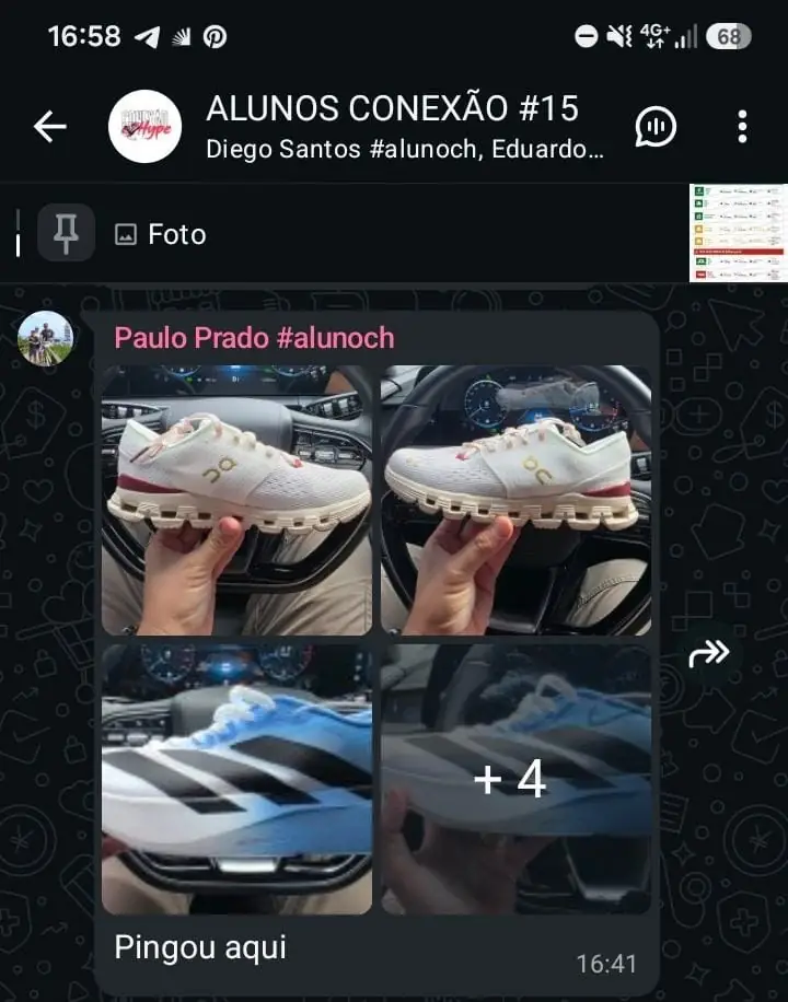 Membro mostrando os tênis importados